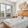 large windows brighten bedroom
