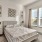 windows in carpeted bedroom