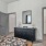 bedroom with private bathroom and walk-in closet