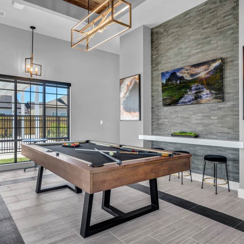 billiards table in game lounge