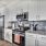 stainless steel appliances in open kitchen